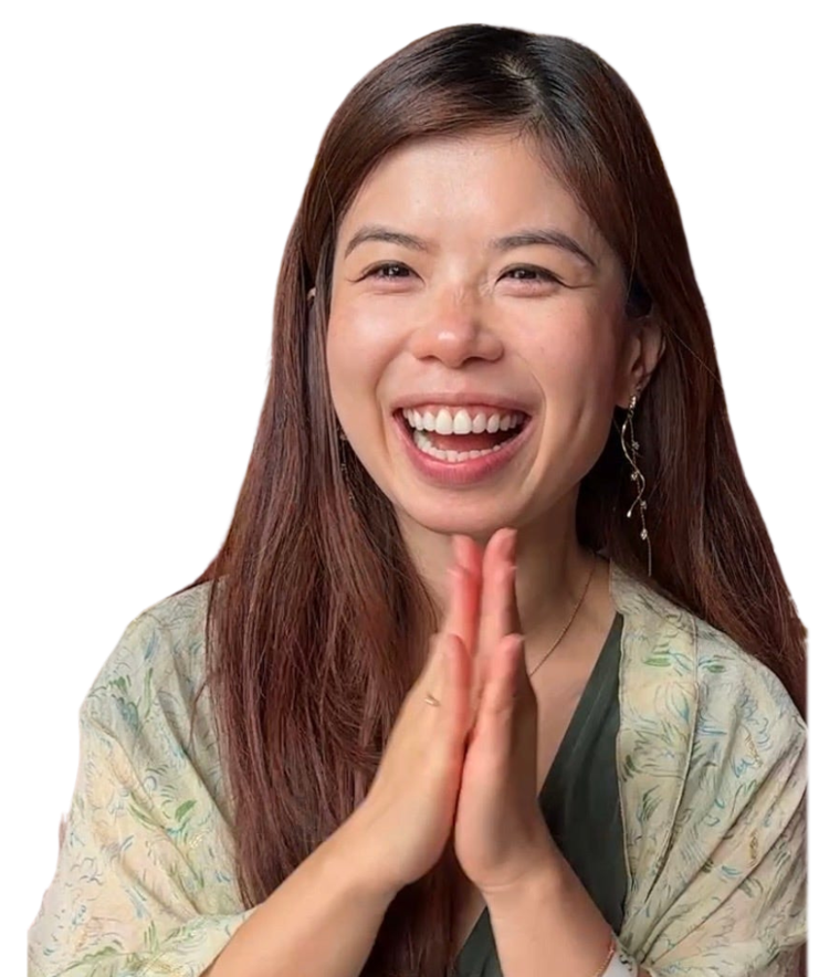 Joei Chan laughing, hands pressed together